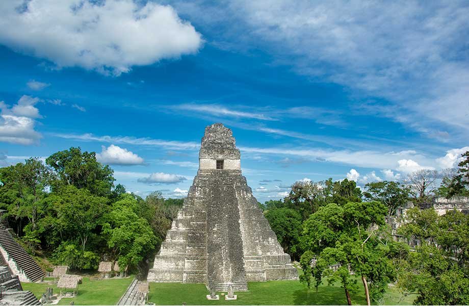 Stunning view of the Great Jaguar Temple, one of the ancient Mayan pyramids, amidst the dense jungle in Tikal National Park, Guatemala - featured in the Tikal Guide 2023.